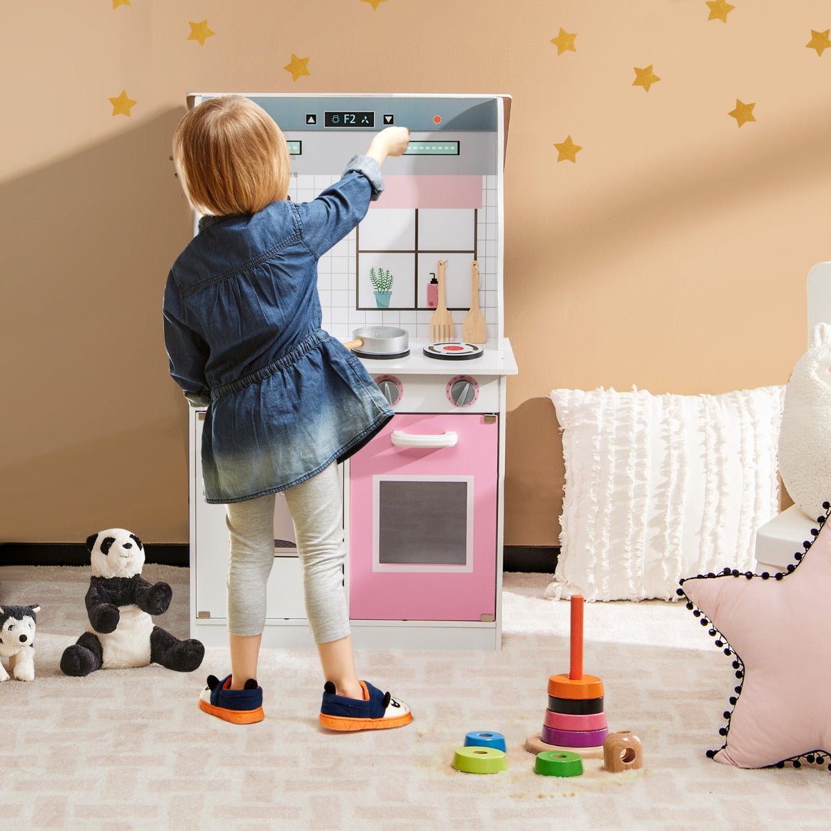 Child Playing with Kitchen