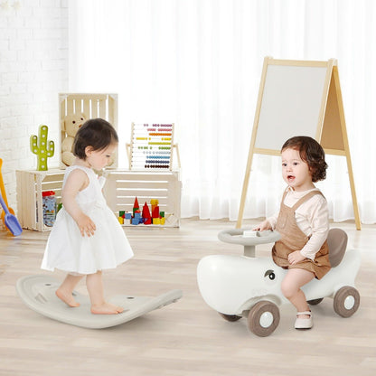 Versatile 3-in-1 kids toy with rocking pony, balance board, and slide car in white.