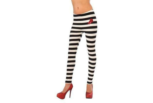 Black and white striped leggings styled as Wicked Witch. Perfect for kids costume play.