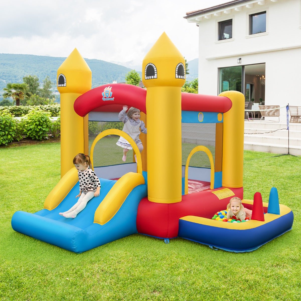 Kids 5 in 1 inflatable bounce castle with slide and ball pit for playful home fun