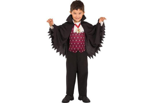 Kids vampire costume with cape and medallion for spooky Halloween fun at home.