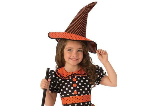 Girls polka dot witch Halloween costume with hat for playful childrens dress-up at home.