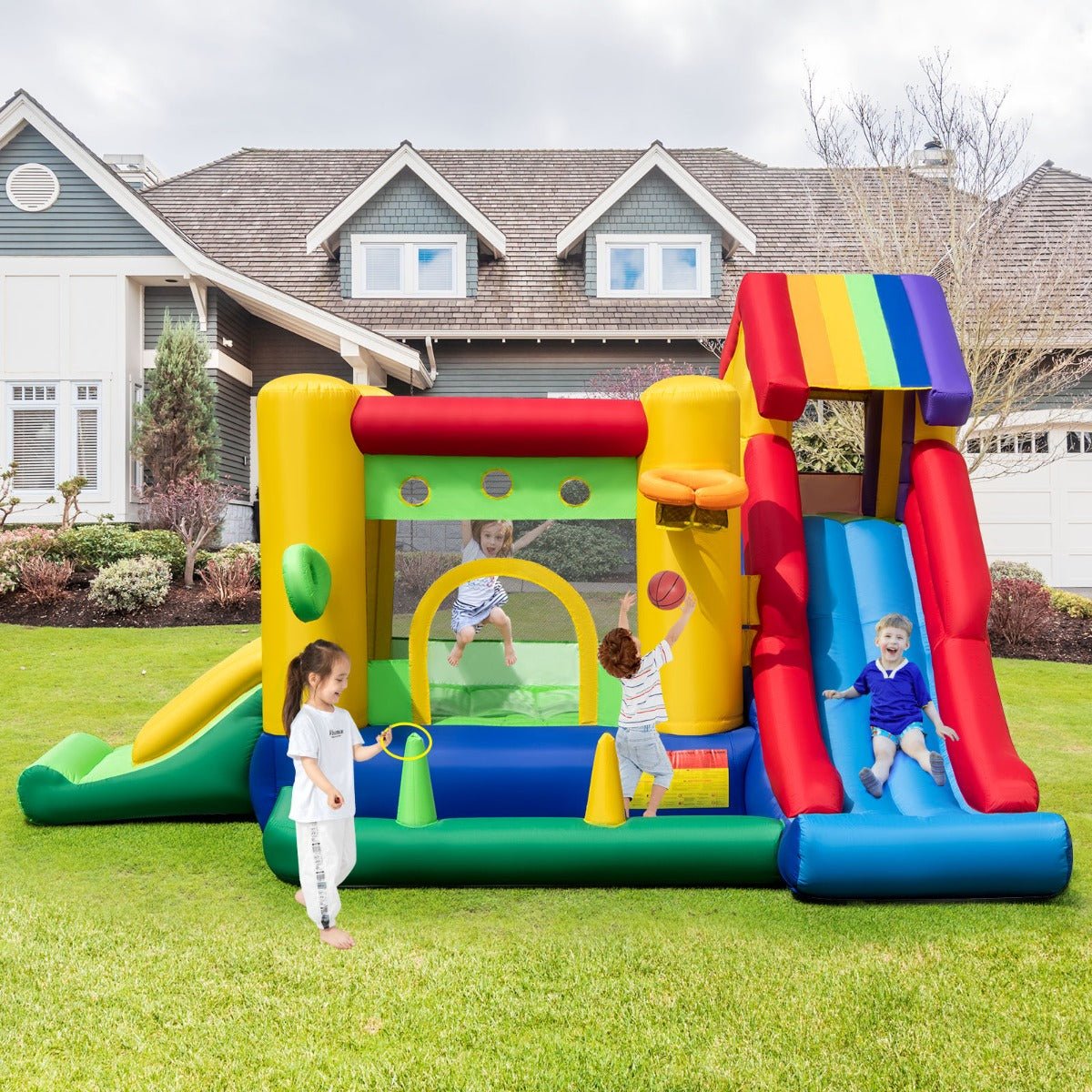 Slide into Summer with the 7-In-1 Rainbow Castle Inflatable