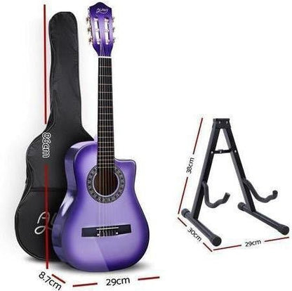 Childs 1/2 size purple acoustic guitar with capo tuner for home music playing.