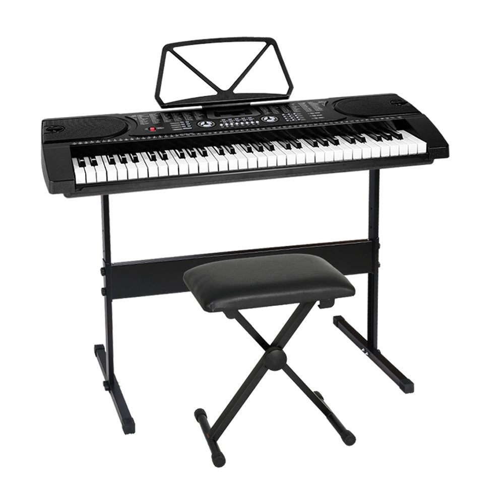 Portable electric piano keyboard with stand and stool for kids, in sleek black design.