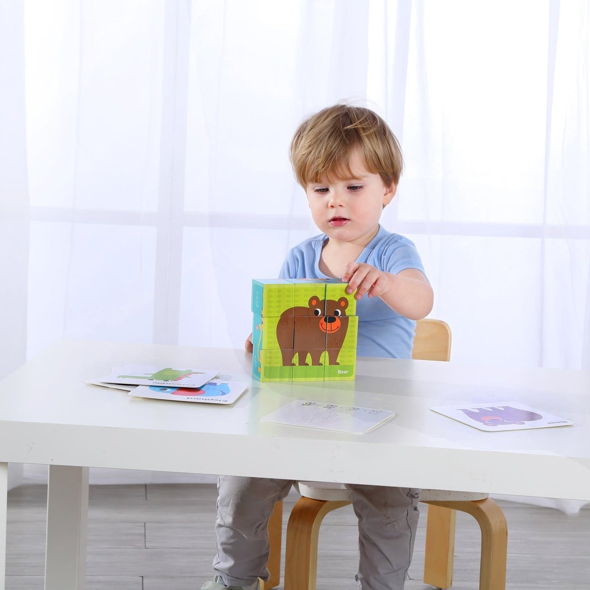 Colorful animal block puzzle with drawing card for fun learning and creativity at home.