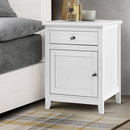 White bedside table with big storage drawers, perfect for childrens rooms.