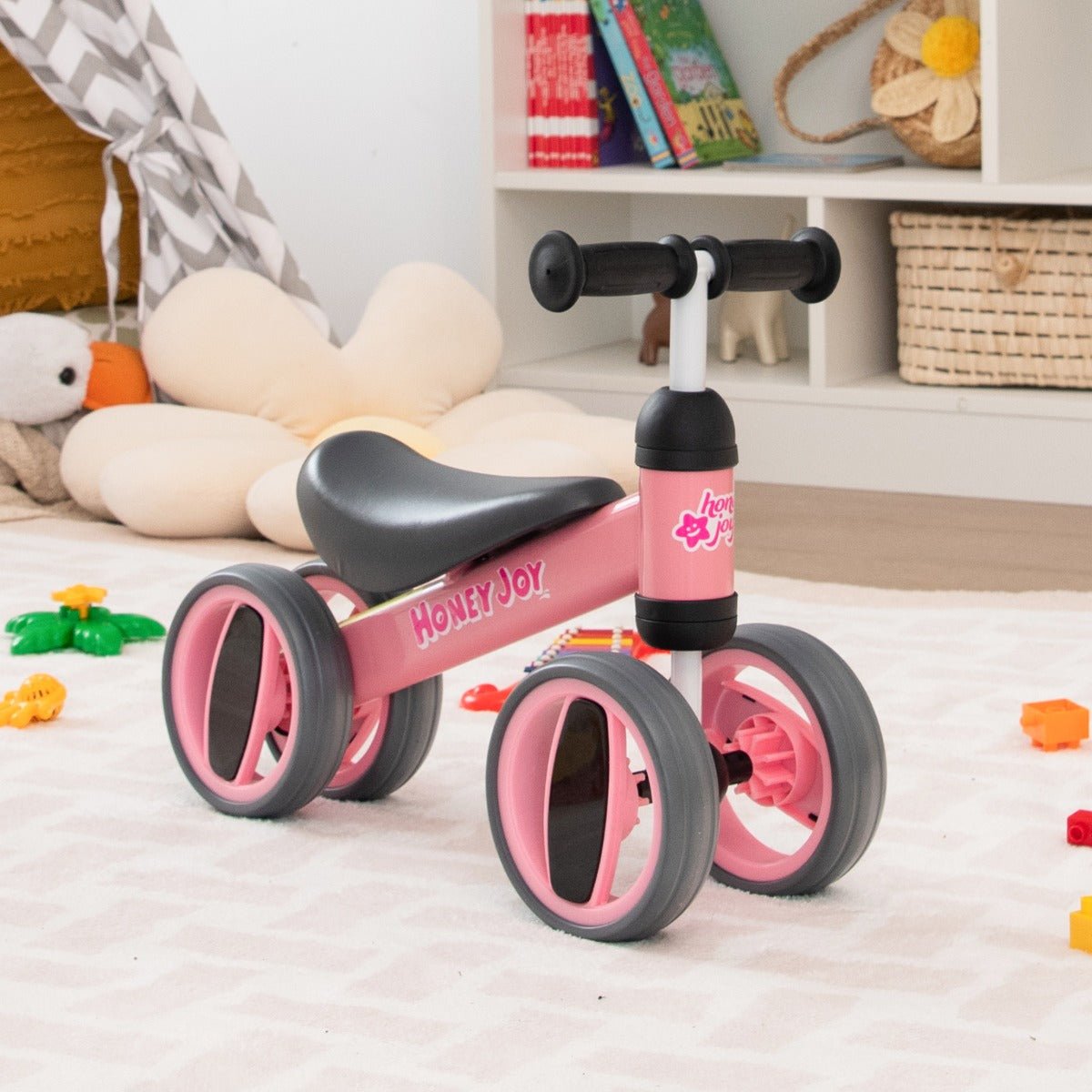 Discover Joy: Pink Baby Balance Bike with 4 Wheels