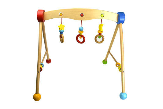 Colorful Baby Gym with hanging toys for sensory development and playtime at home.