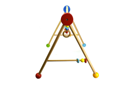 Interactive baby gym with dangling toys for sensory development and playtime at home.