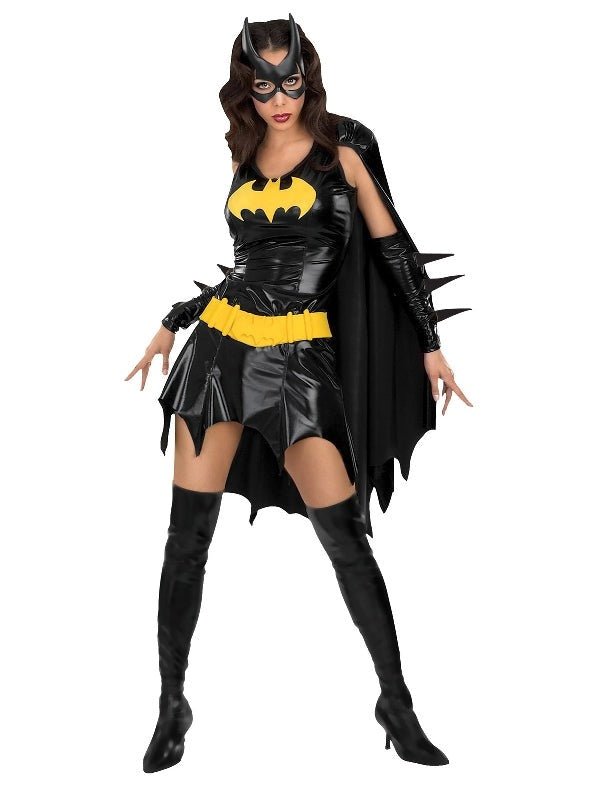 Official Batgirl DC Comics adult costume with dress, cape, and boot tops for home play.