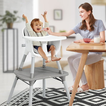 Convertible grey highchair with harness, ideal for children, versatile 5-in-1 design for home use.