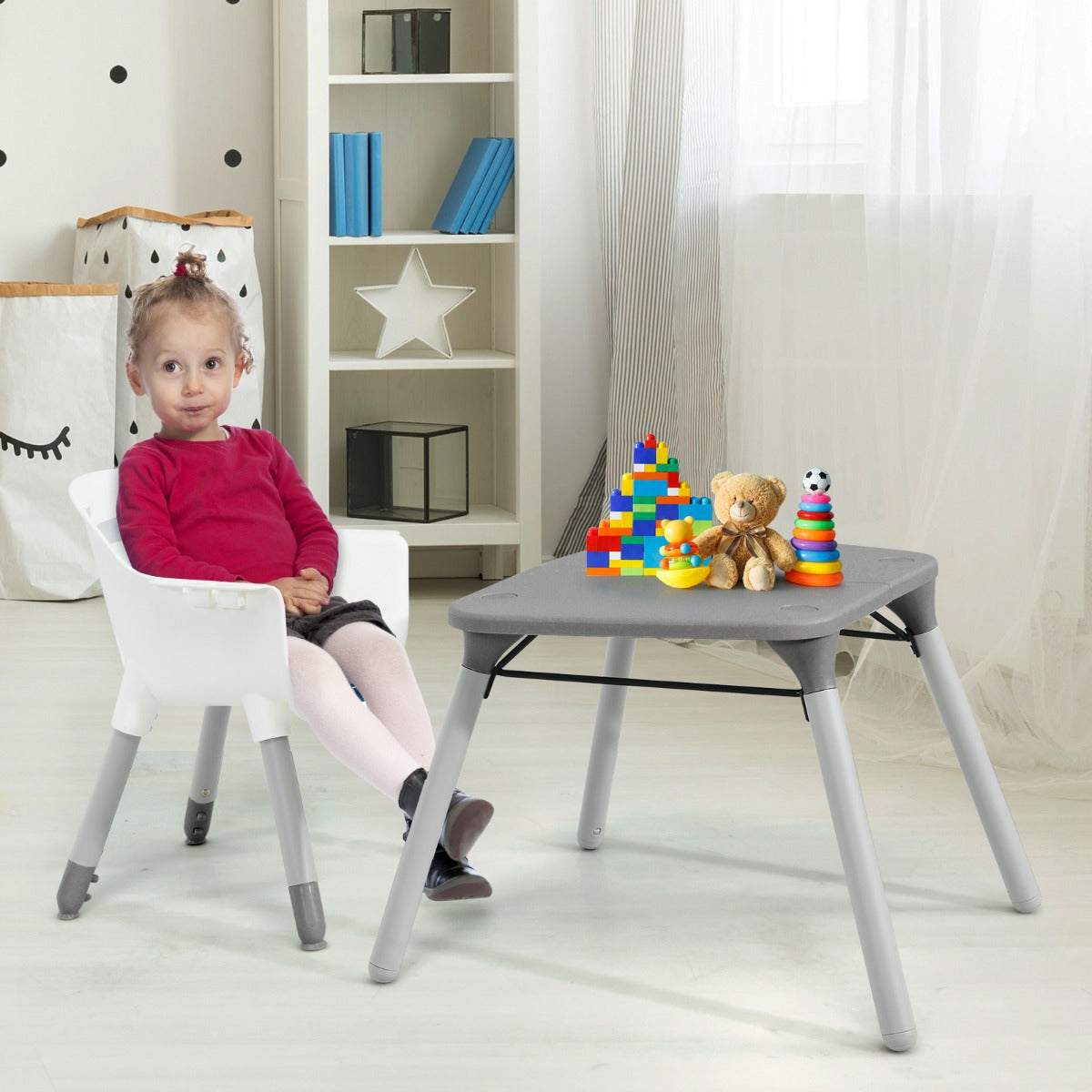 5 in 1 convertible baby highchair in grey color with safety harness for versatile use.