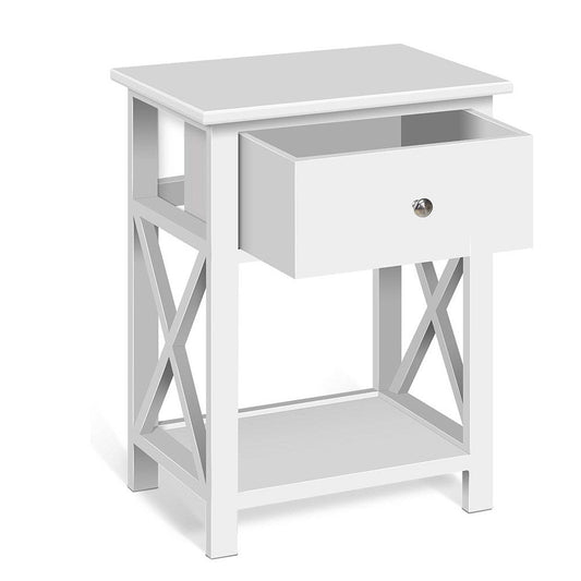 White wooden bedside table with drawer and shelf for kids bedroom organization.