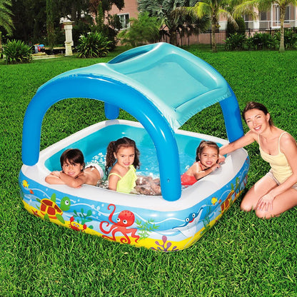 Inflatable canopy swimming pool for kids, ideal for backyard fun and cooling off.