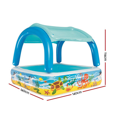 Inflatable canopy swimming pool offers shade and fun for kids at home.