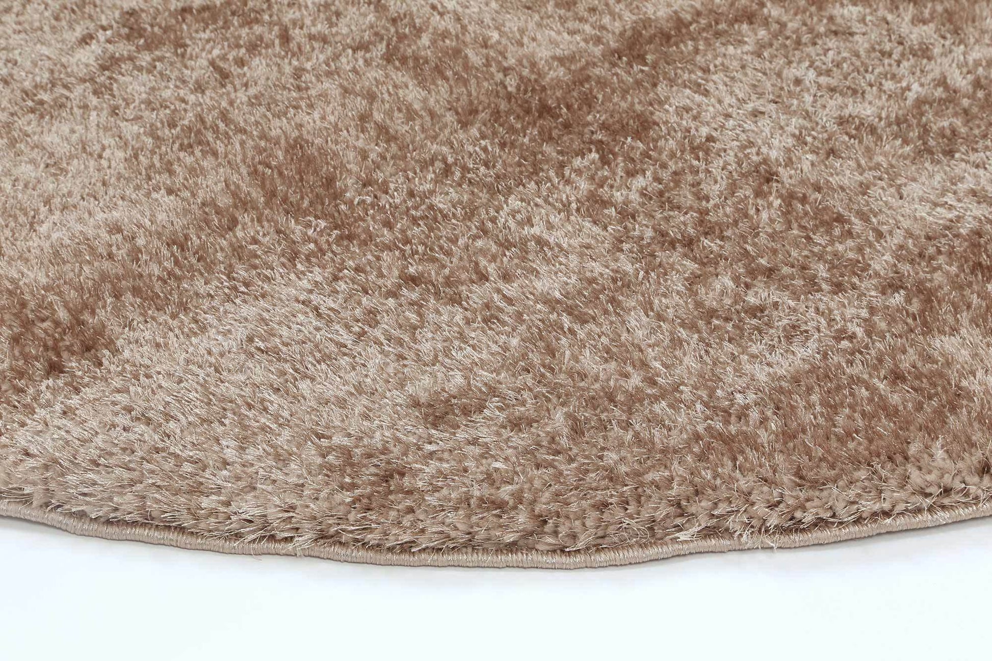 Brendon Camel shaggy round rug for cozy and playful childrens bedroom decor.