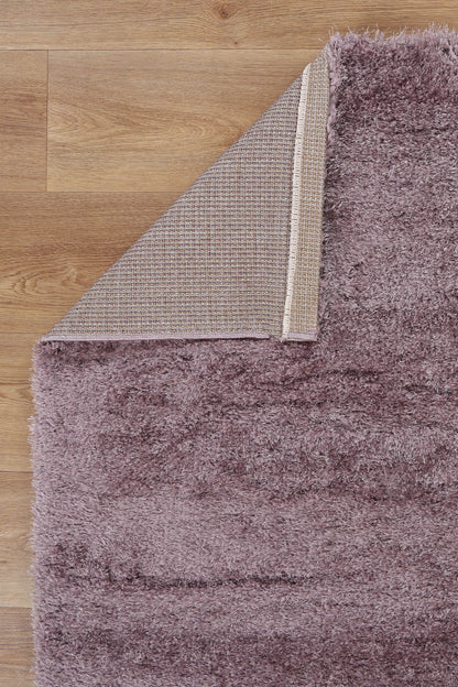 Brendon Lilac Shaggy Rug for cozy play areas, soft feel and vibrant color appeal.