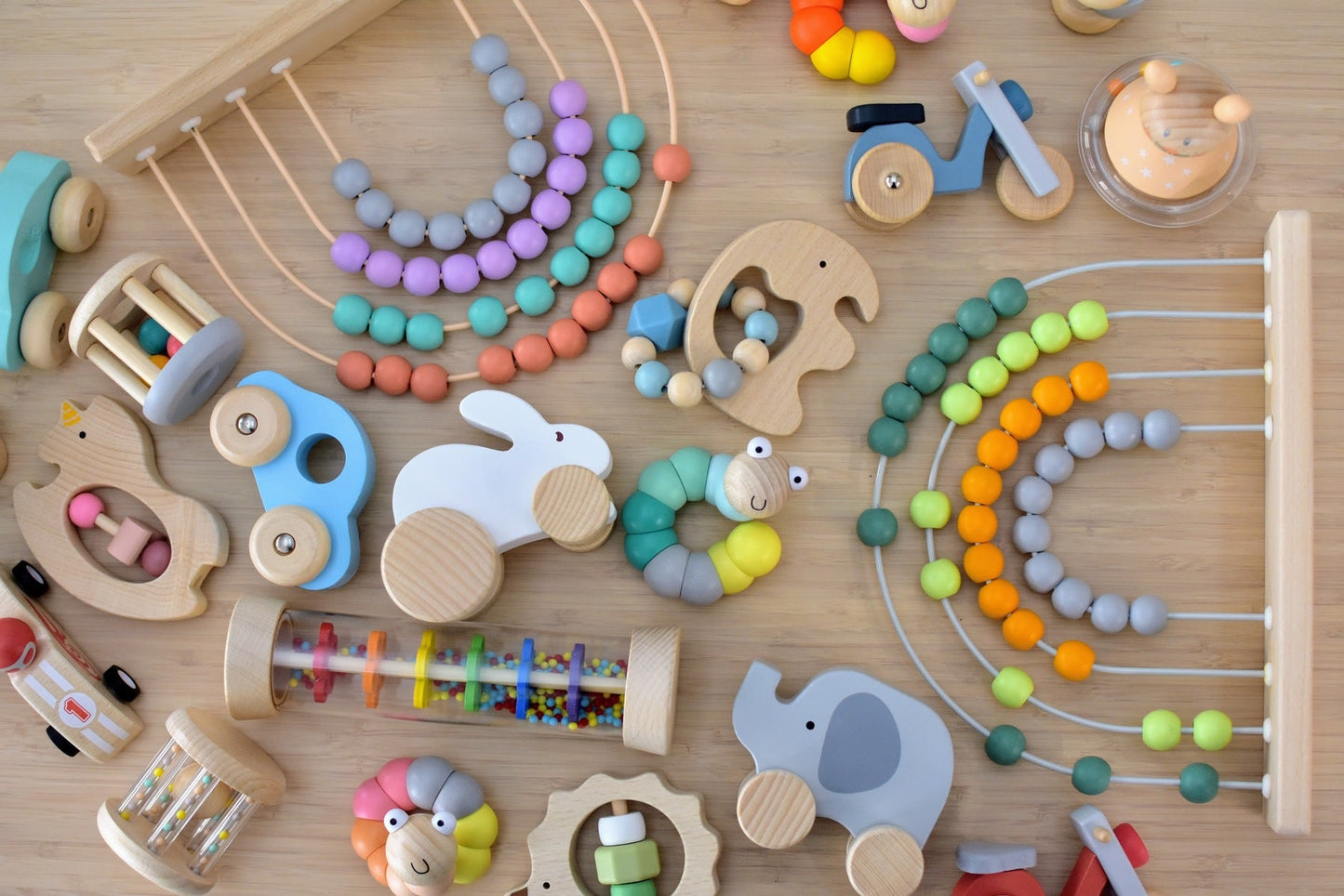 Colorful rainbow abacus for young learners, promoting calm and educational play at home.