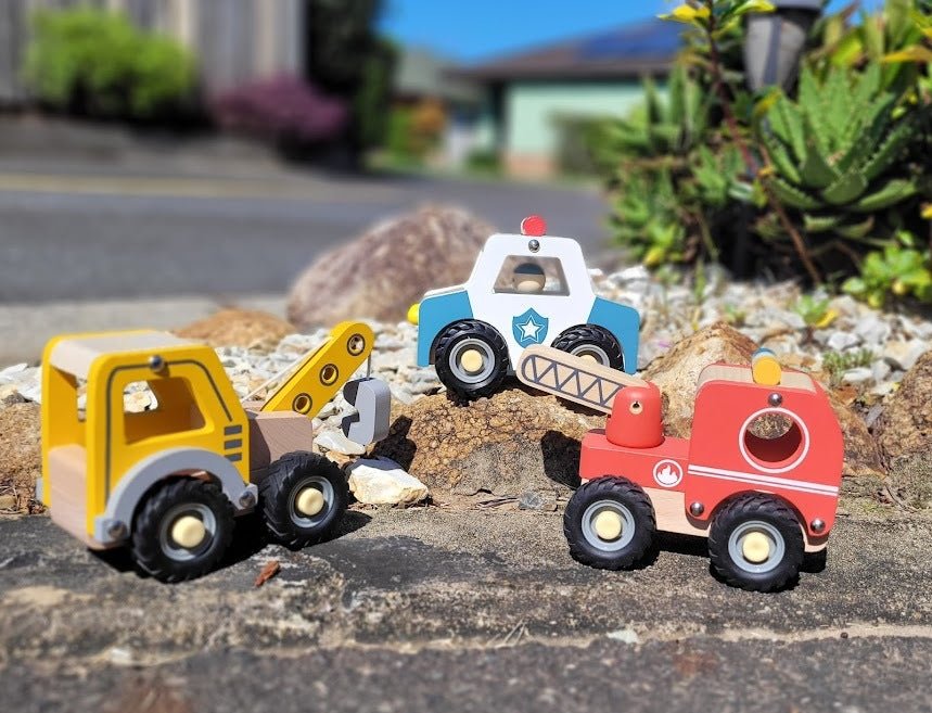 Red toy tractor with rubber wheels designed for childrens imaginative play at home.