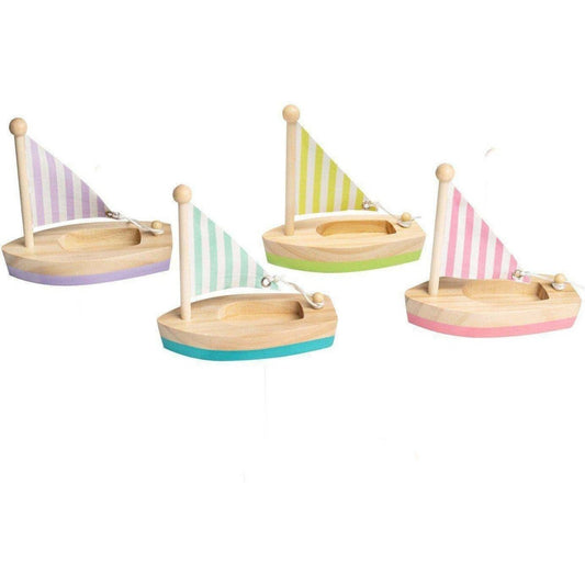 Small wooden sailboat for childrens decor, featuring calm and breezy design. Perfect for home.