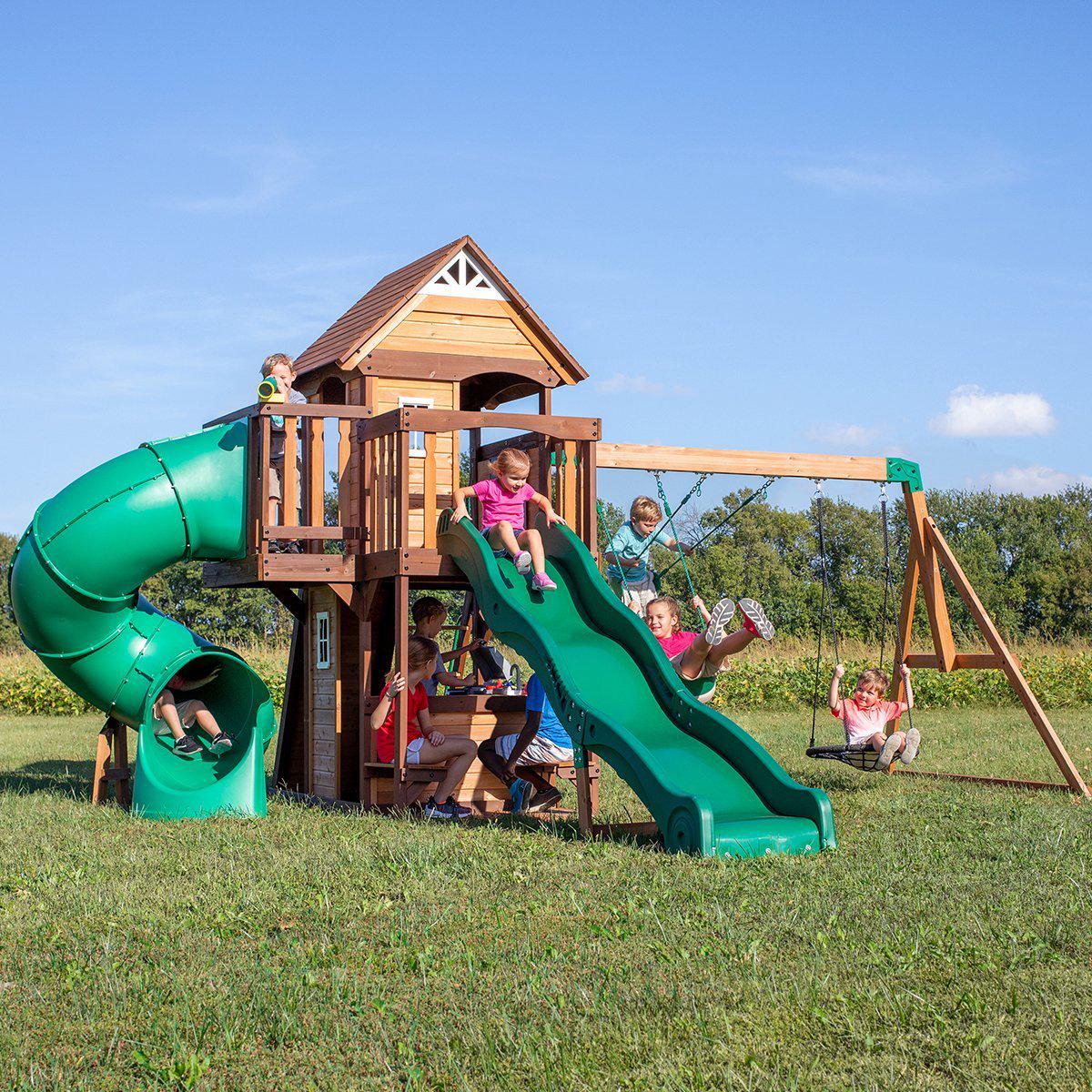 Backyard Discovery Cedar Cove Wooden Swing Set and Play Centre for fun outdoor play.