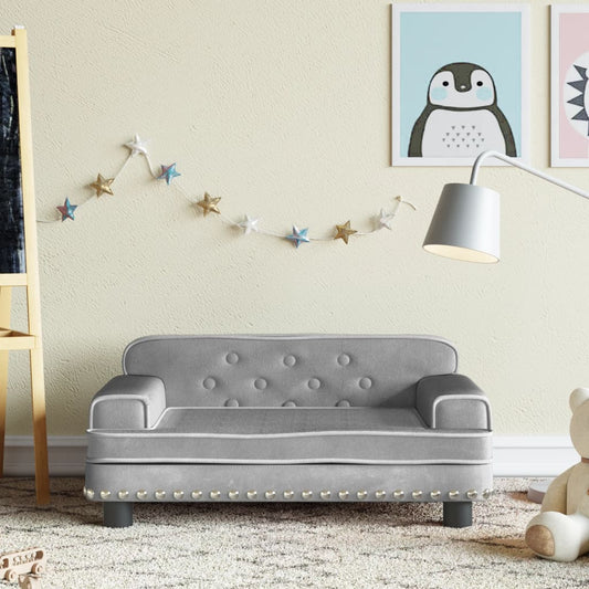 Light grey velvet kids sofa perfect for creating a cozy reading nook ambiance.