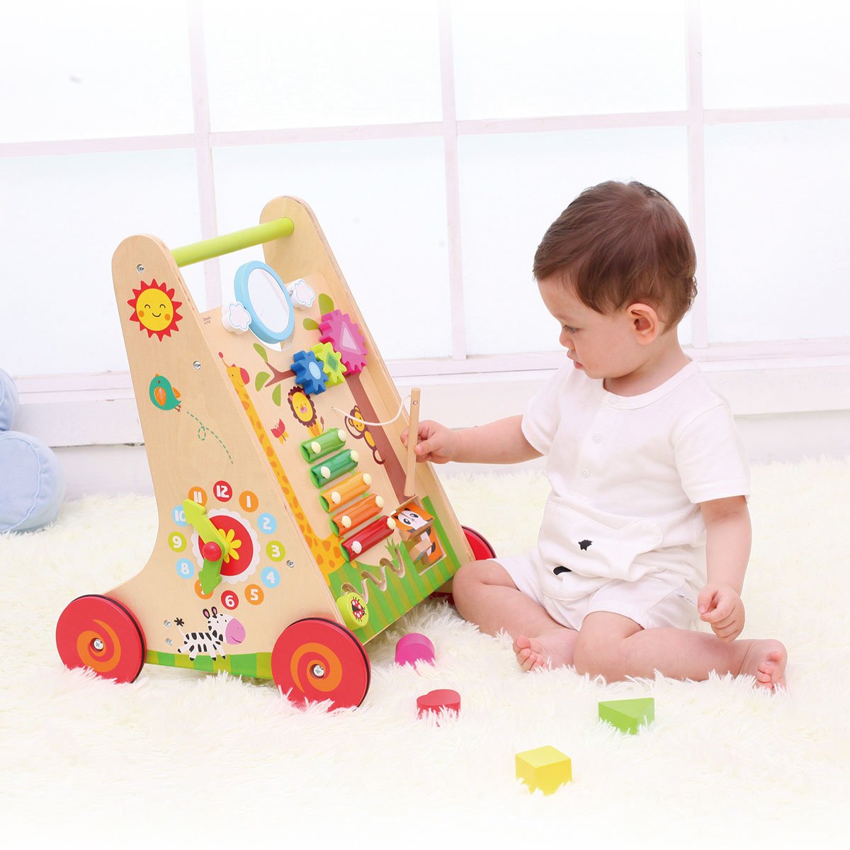 Wooden learning walker with xylophone and shapes, engaging toy for babies to enhance motor skills.