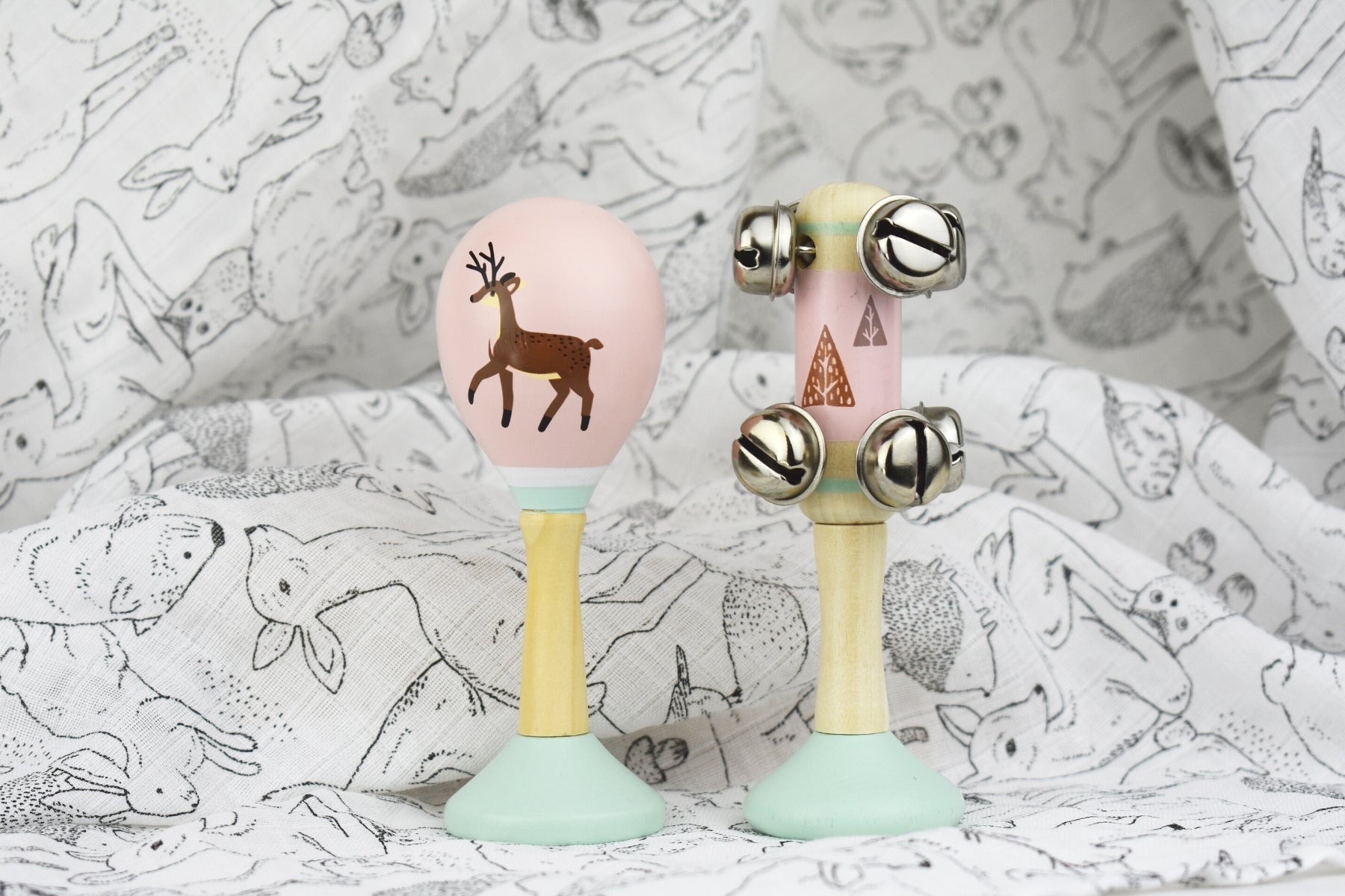 Wooden deer maraca and bell stick set for childrens musical play at home.