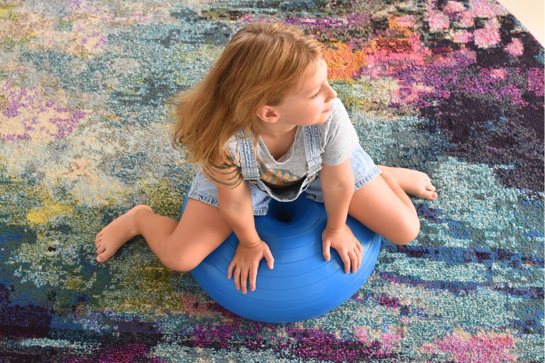 Blue Donut Balance Ball for childrens active play and balance training at home.