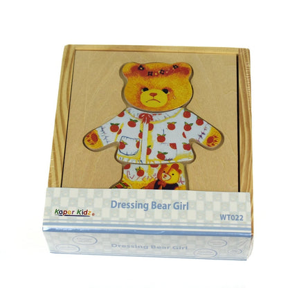 Adorable girl bear stuffed animal dressed in cute attire, perfect for childrens room decor.