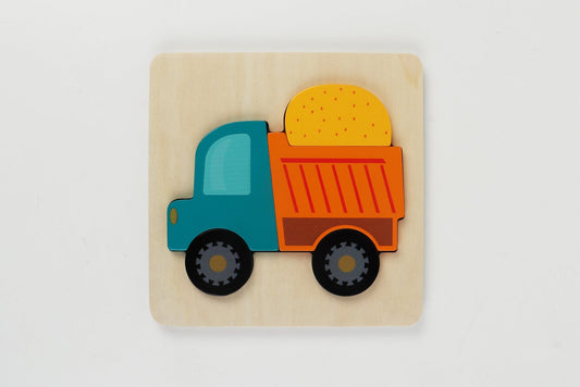 Colorful dump truck chunky puzzle for kids, great for developing fine motor skills at home.