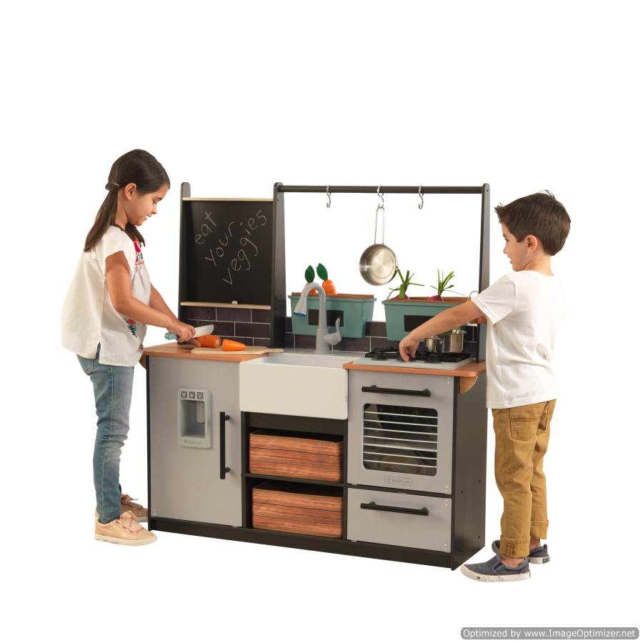 Child Engaged with KidKraft Farm to Table Play Kitchen