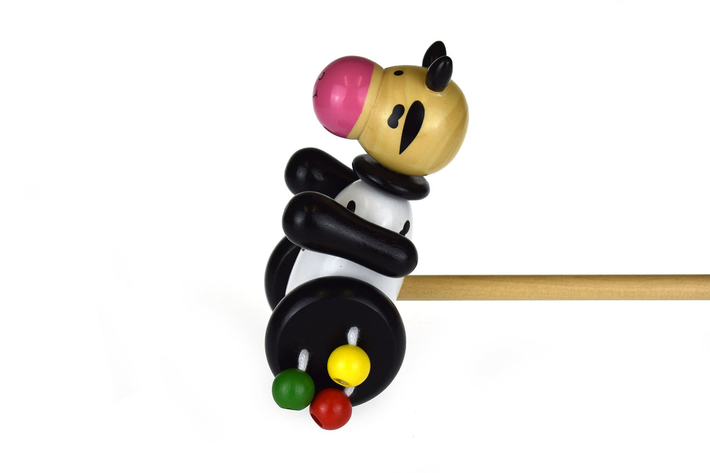 Wooden push along cow toy for kids, designed as a farmyard friend play companion.