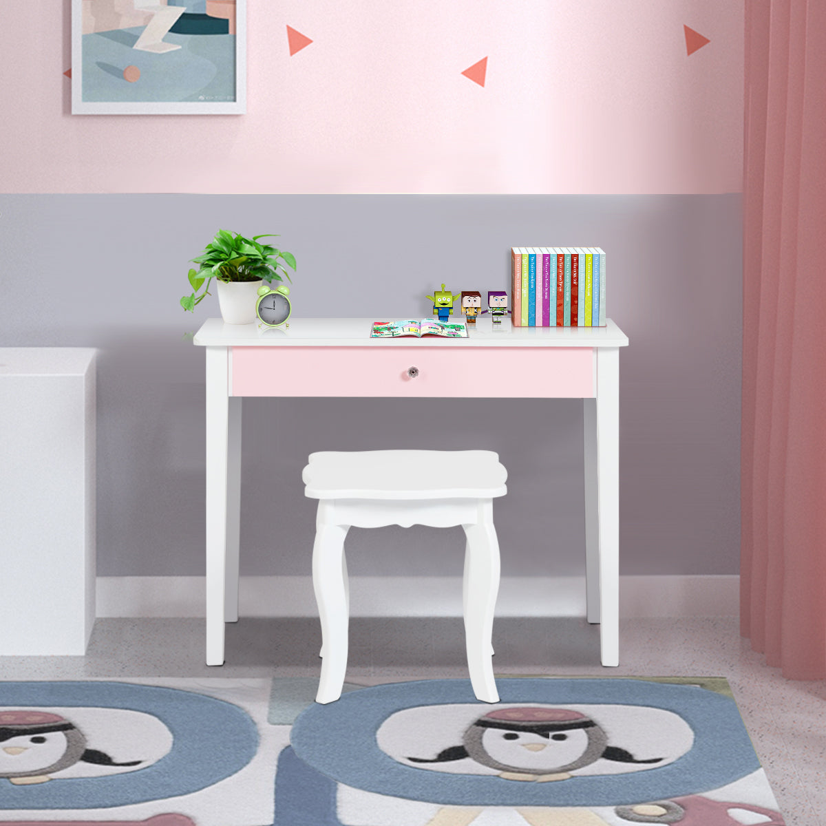 White wooden vanity set with mirror and stool for kids grooming and play area.