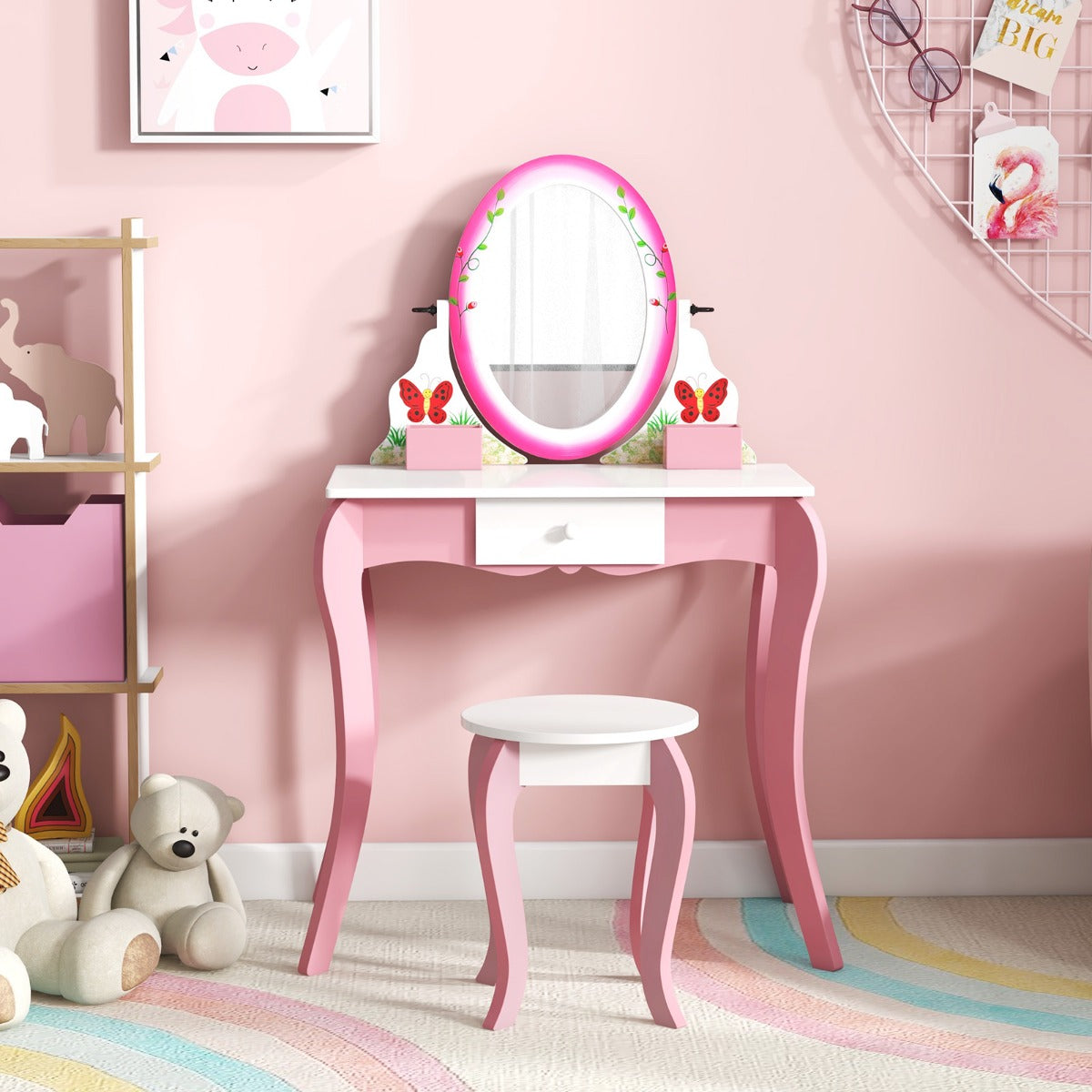 Kids vanity set with rotating mirror and whiteboard for playful beauty and pretend play.