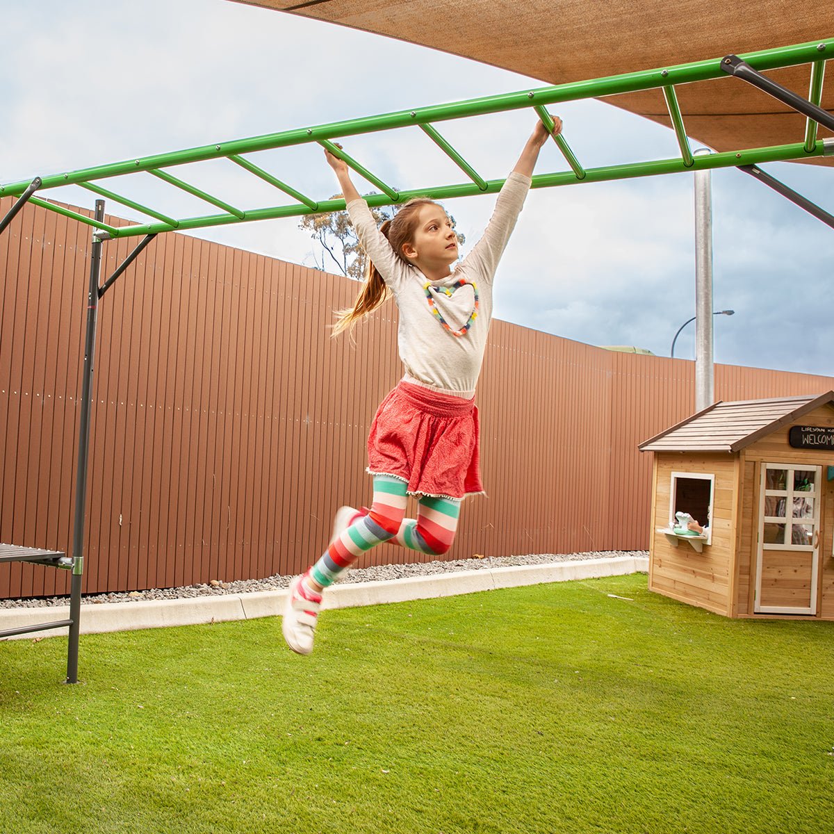 Junior Jungle Zambia Outdoor Playground Set with Monkey Bars for active kids at home.