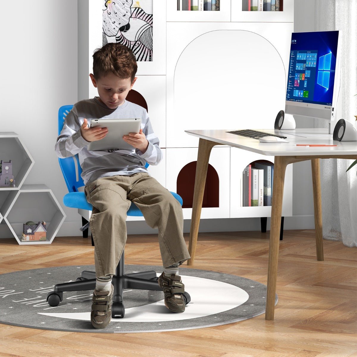Blue adjustable height kids mesh office chair on wheels for comfortable homework and play.