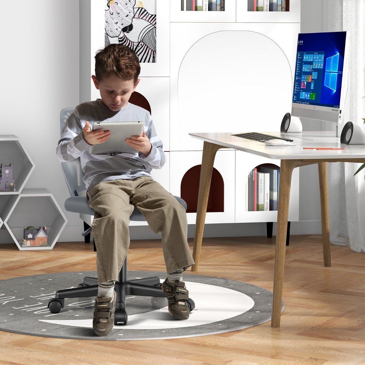 Kids office chair | Adjustable grey mesh design with wheels for a comfortable study space.