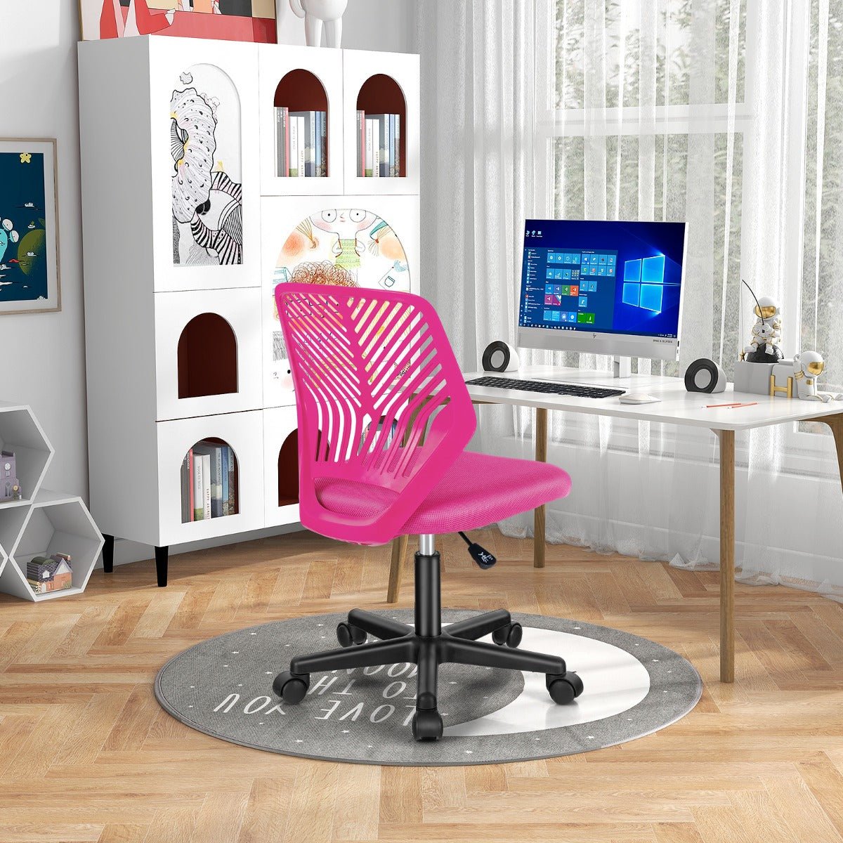 Kids pink mesh office chair with wheels, ideal for homework or play, adjustable height.