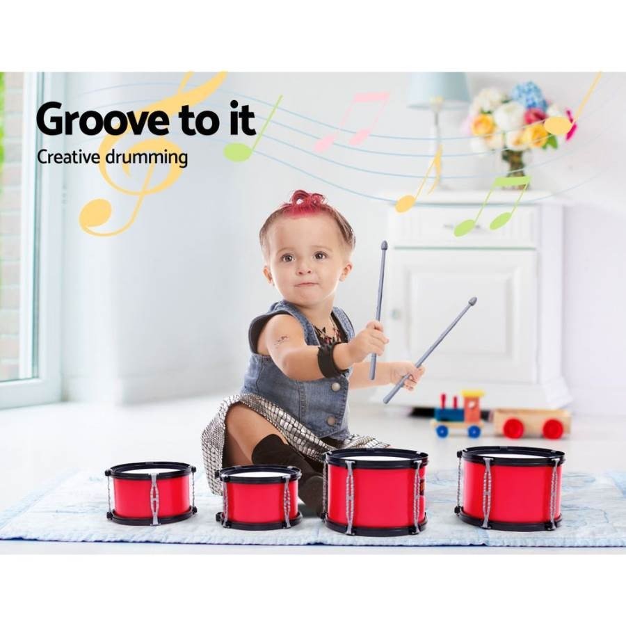 Colorful kids junior drum kit toy in red for fun and learning at home.