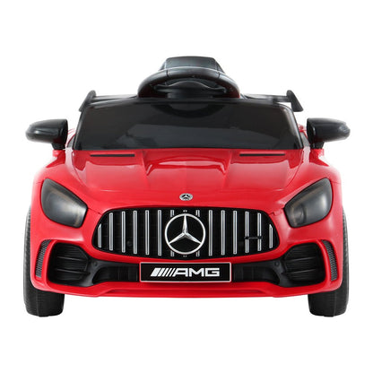 Red 12V Mercedes-Benz AMG GTR electric toy car for kids home playtime.