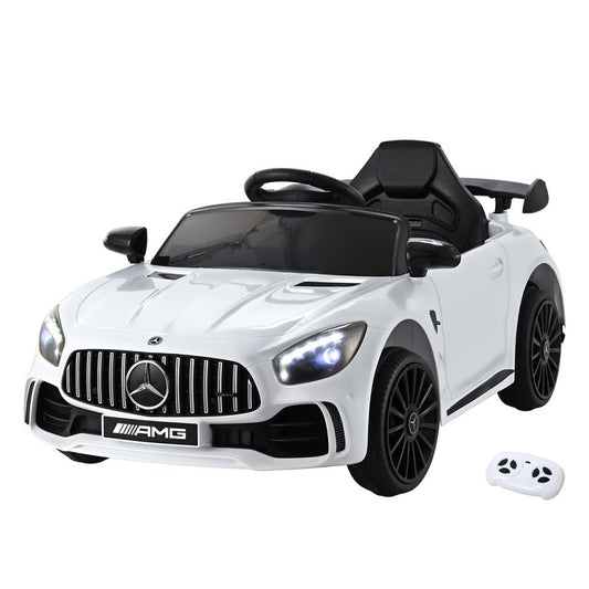 White Mercedes-Benz AMG GTR ride-on car for kids, 12V electric toy with realistic features.