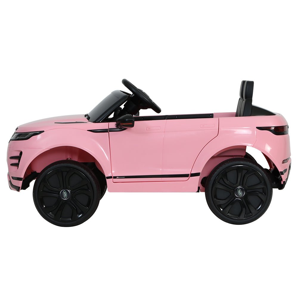 Kids pink Land Rover ride-on car, 12v battery, perfect for outdoor fun at home.