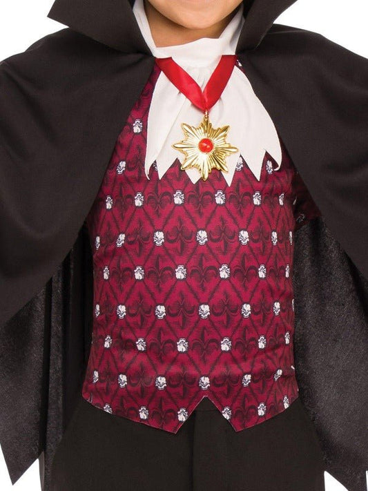 Kids vampire costume set with cape and medallion for imaginative play at home.