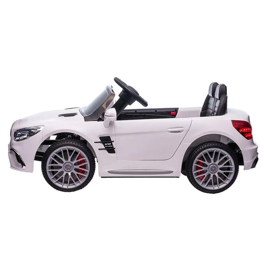 White Mercedes SL65 AMG Kids 12v Electric Ride On Car, ideal for childrens backyard adventures.