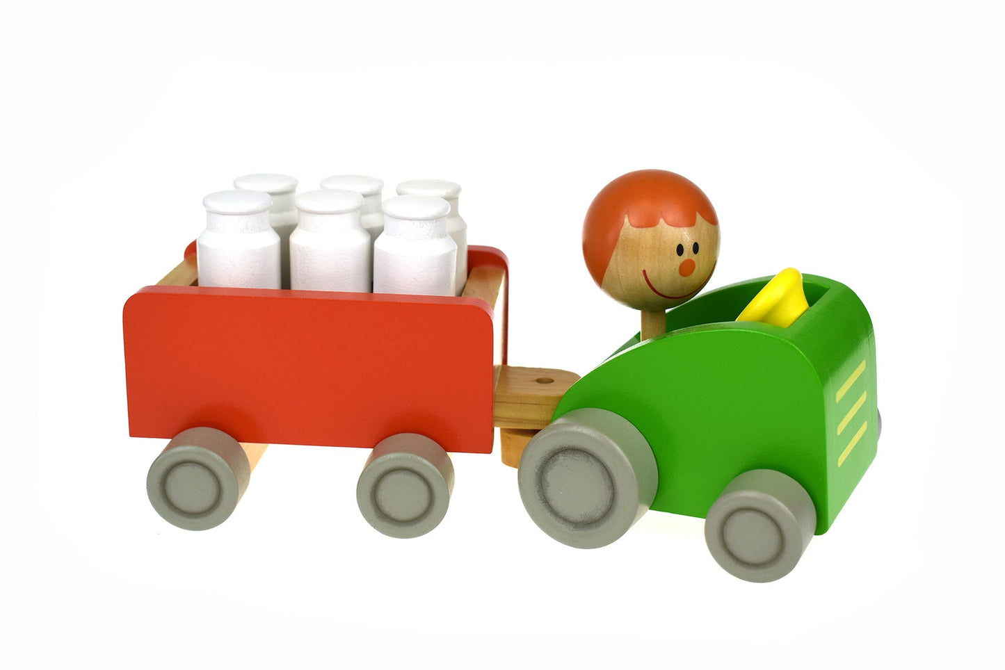 Colorful toy tractor with milk bottle pins for fun and interactive indoor bowling game.