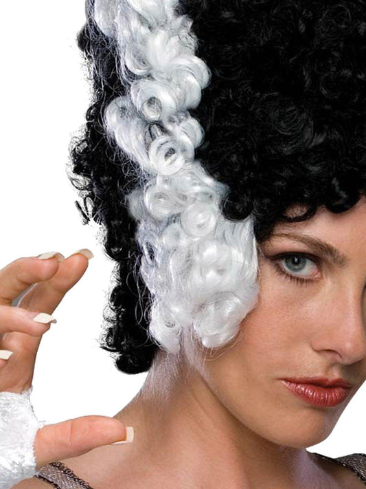 Curly black and white monster bride wig for adults, ideal for Halloween costumes.