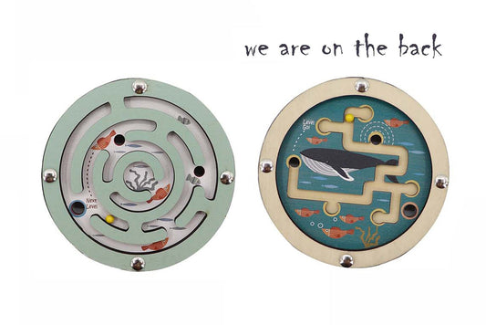 Ocean maze toy for kids, double-sided disc design for interactive play at home.