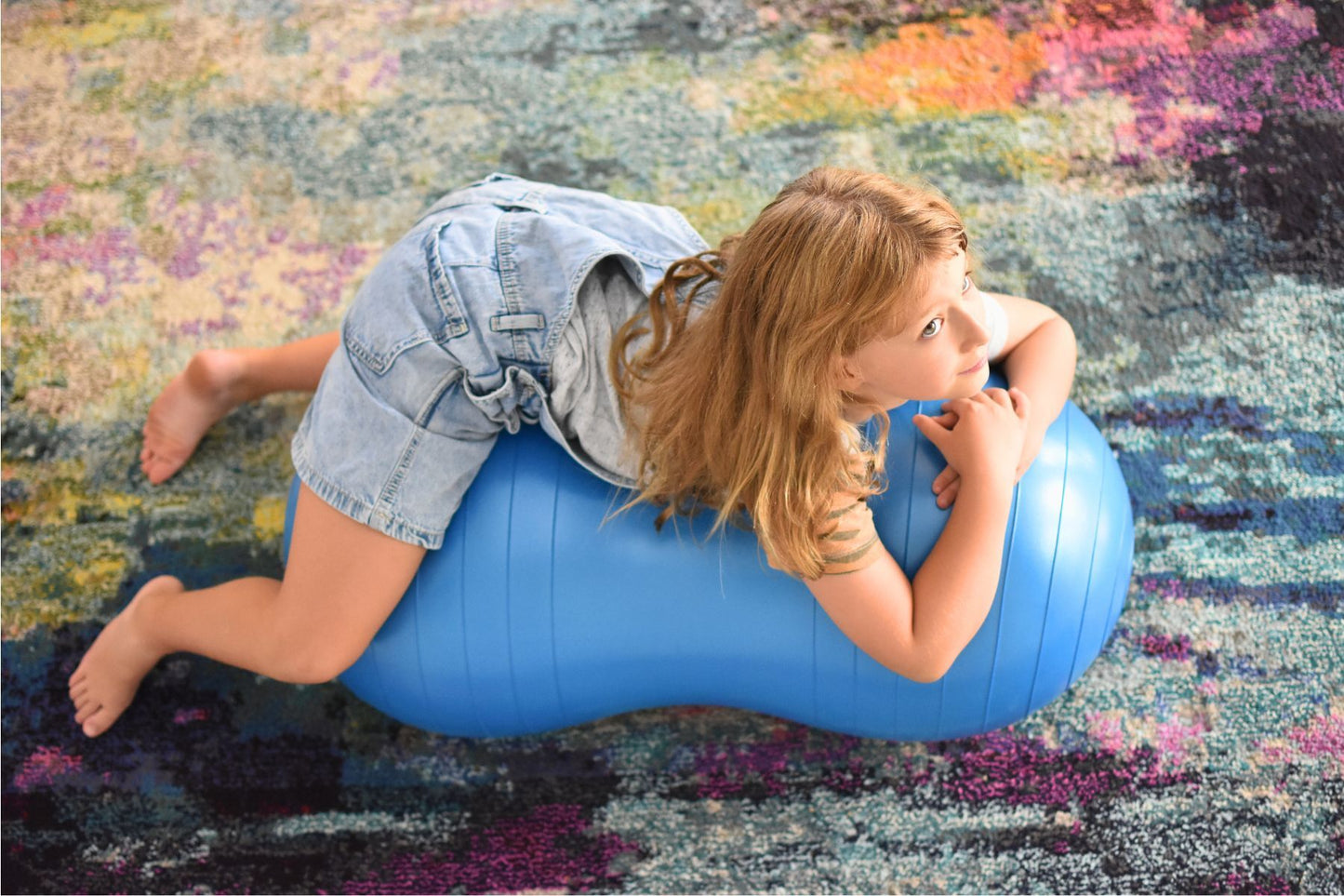 Blue Peanut Balance Ball for kids and adults, promotes fitness and fun at home.